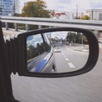 auto-collision looking thru the side mirror